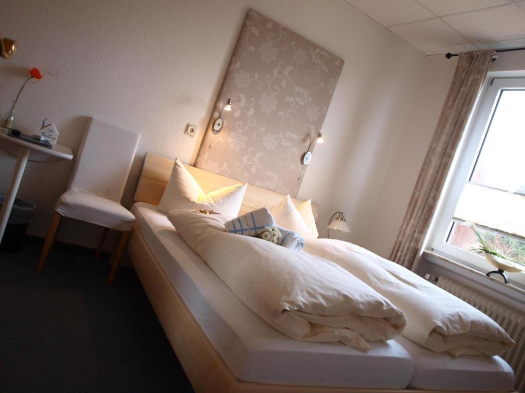 Hotel Ostfriesland Garni Norden Szoba fotó